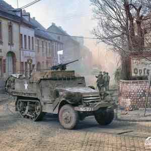 Obrázek 'March 27 1945 - M3A1 moves through Engers'