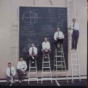 Obrázek 'NASA scientists with their board of calculations. 1960s'