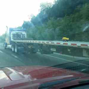 Obrázek 'a truck trucking a truck'