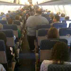 Obrázek 'fat guy on plane'