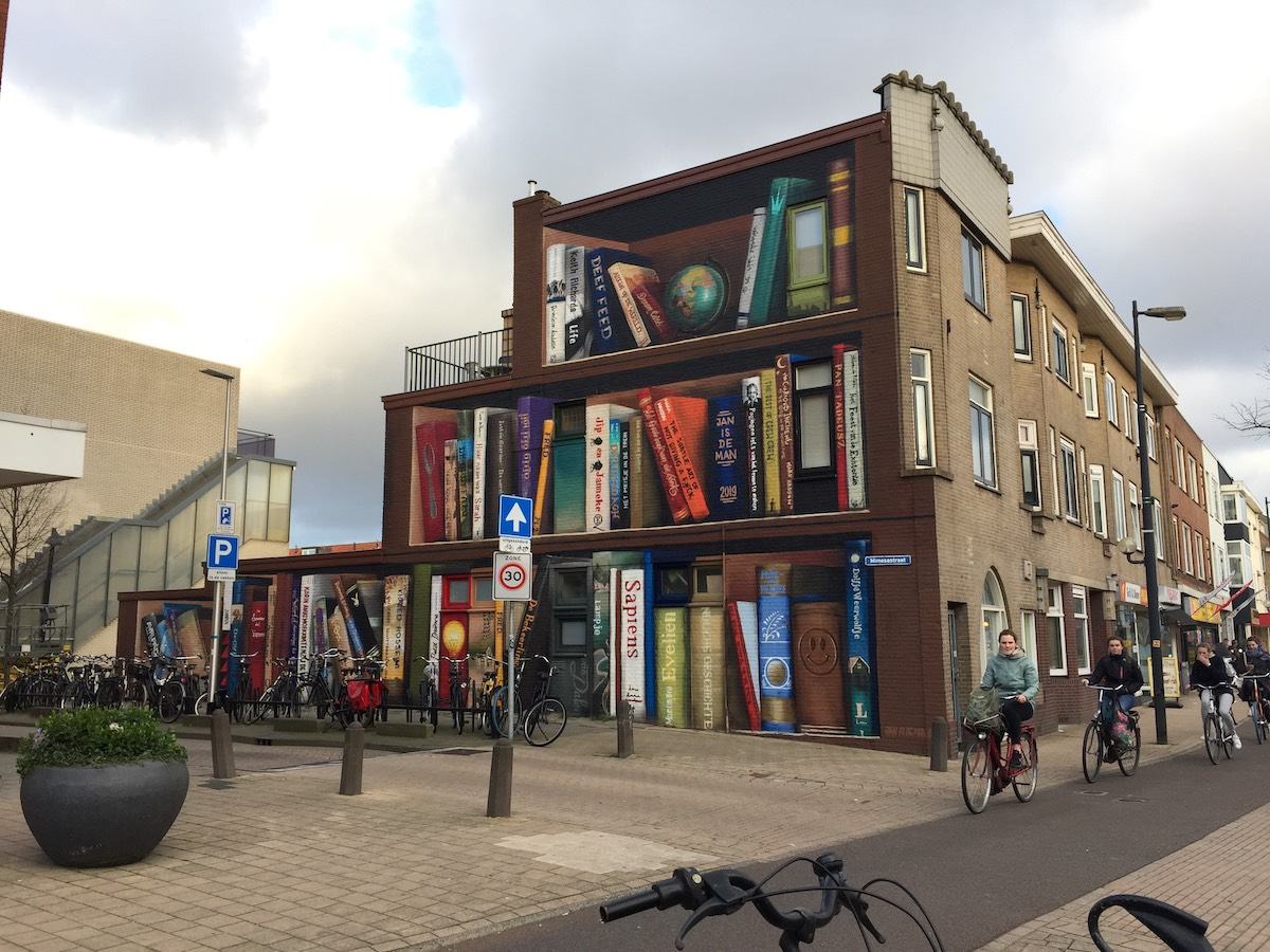 Obrázek - street-art-illusion-bookcase-jan-isdeman -
