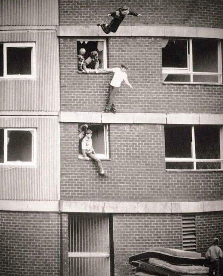 Obrázek Children jumping onto mattresses England 1980s