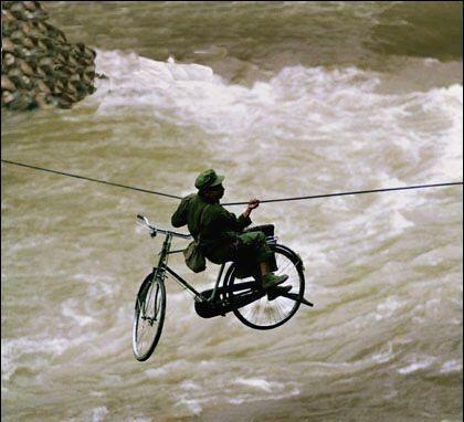 Obrázek Couldnt You Just Ride Your Bike on the Wire