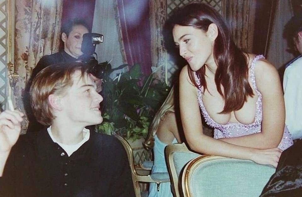 Obrázek Leonardo DiCaprio and Monica Bellucci at Paris Fashion Week 1995