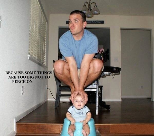 Obrázek Man Perches on Babys Head