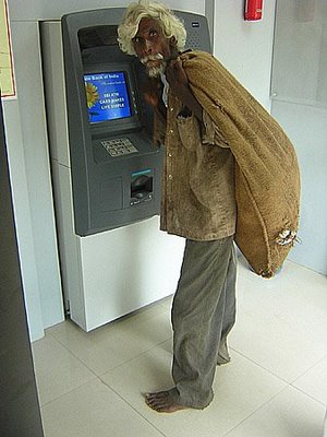 Obrázek beggar at atm india