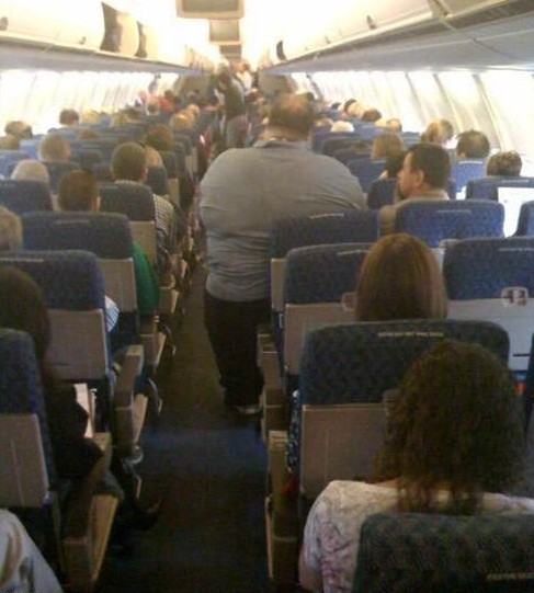 Obrázek fat guy on plane