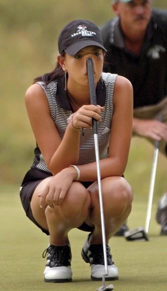 Obrázek golfistka s holi